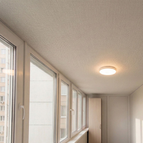 Тканевый натяжной потолок на балконе